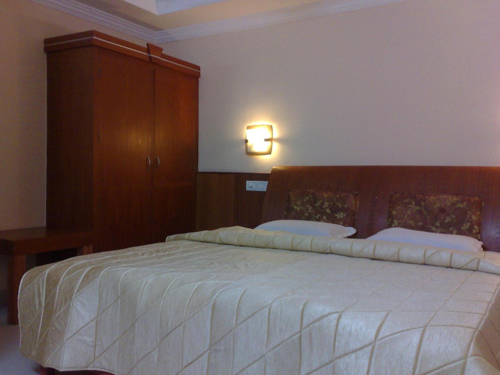 Hotel Kpm Regency à Palakkad Chambre photo